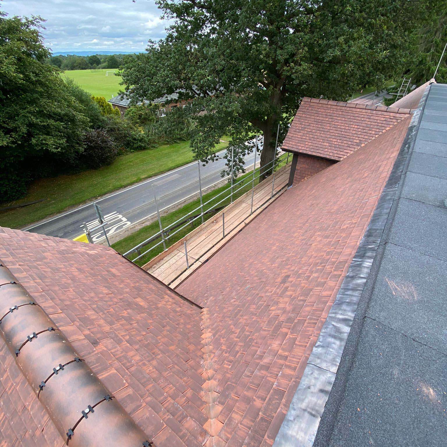 red tiled roof with flat section